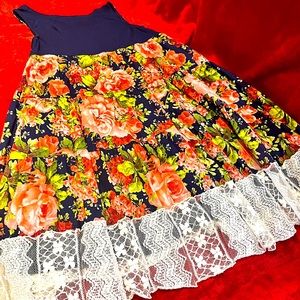 Beautifully made flower dress with white lace.